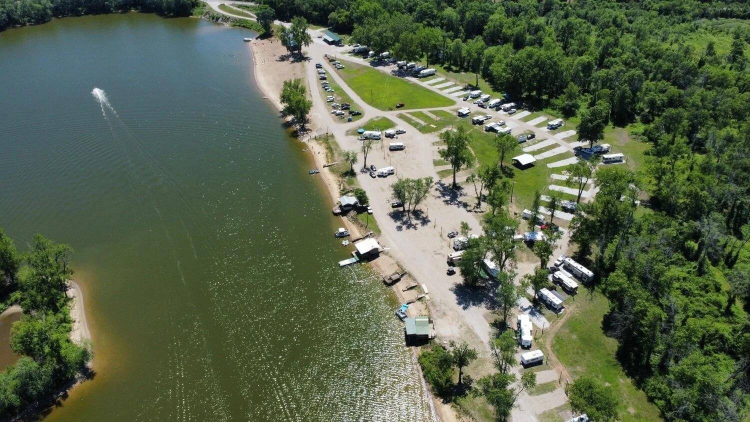 Wide view of Lazy L Lake RV park and campground